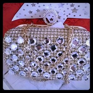 Ringfinger Golden Embellishment Clutch